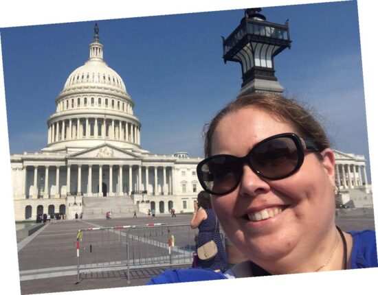 Sarah takes a selfie in front of our nation’s capital during one of her advocacy visits.